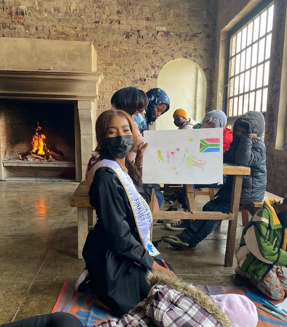 woman smiling with children